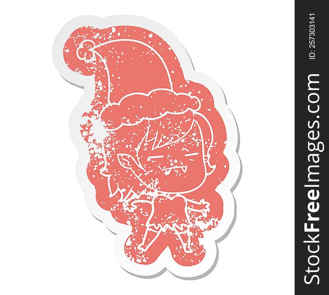 Cartoon Distressed Sticker Of A Undead Vampire Girl Wearing Santa Hat