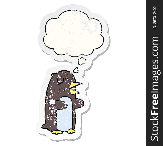 Cartoon Penguin And Thought Bubble As A Distressed Worn Sticker
