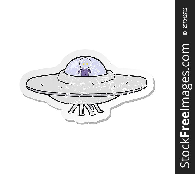 Retro Distressed Sticker Of A Cartoon Alien Flying Saucer