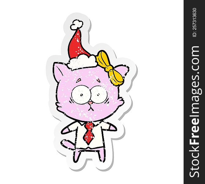 Distressed Sticker Cartoon Of A Cat Wearing Santa Hat