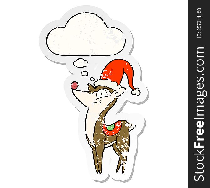 cartoon christmas reindeer with thought bubble as a distressed worn sticker