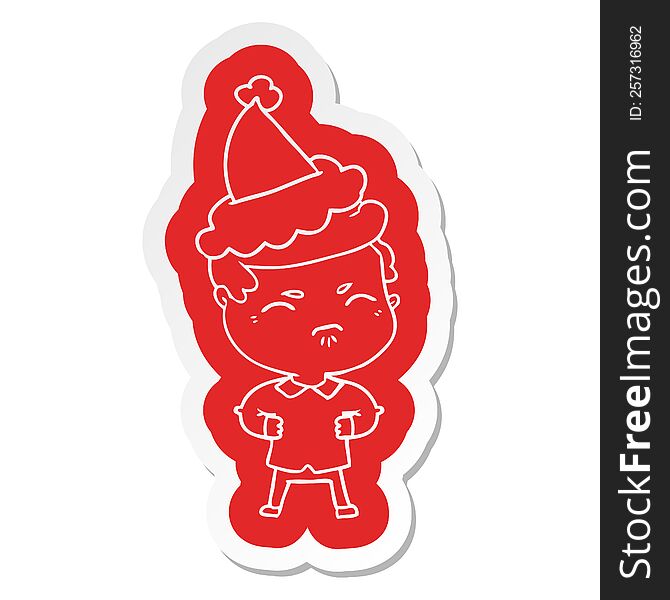 quirky cartoon  sticker of a annoyed man wearing santa hat