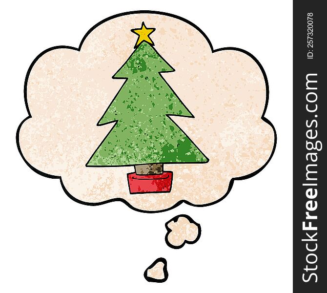 cartoon christmas tree and thought bubble in grunge texture pattern style