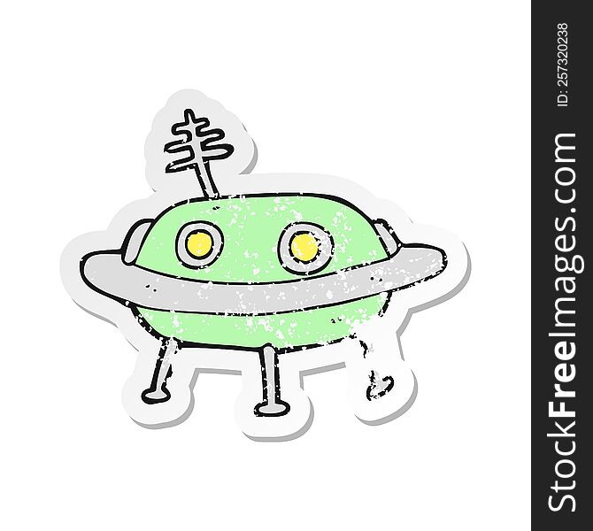 Retro Distressed Sticker Of A Cartoon Alien Spaceship