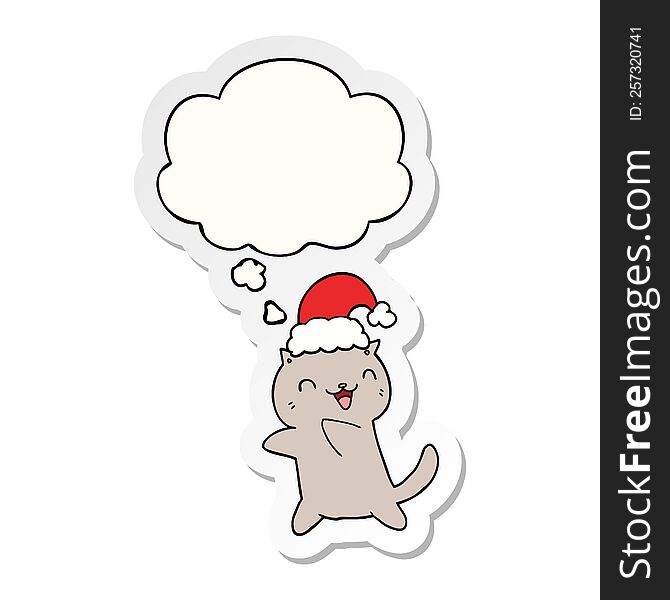 cute cartoon christmas cat with thought bubble as a printed sticker