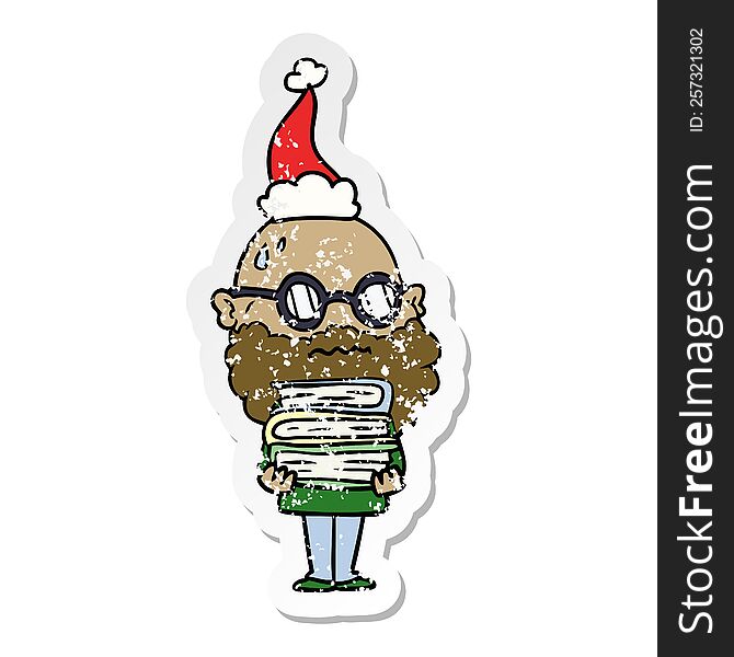 Distressed Sticker Cartoon Of A Worried Man With Beard And Stack Of Books Wearing Santa Hat