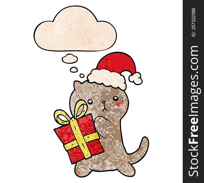 cute cartoon cat carrying christmas present with thought bubble in grunge texture style. cute cartoon cat carrying christmas present with thought bubble in grunge texture style