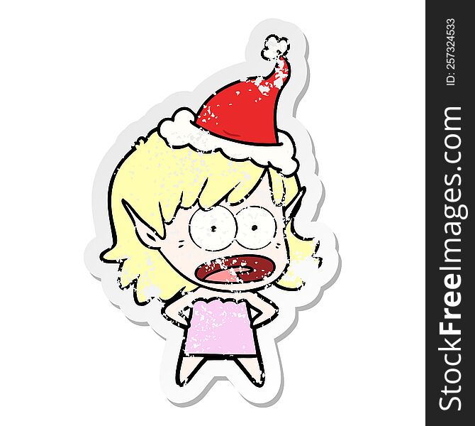 Distressed Sticker Cartoon Of A Shocked Elf Girl Wearing Santa Hat