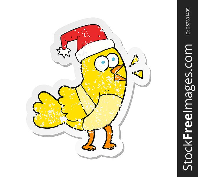 Retro Distressed Sticker Of A Cartoon Bird Wearing Christmas Hat