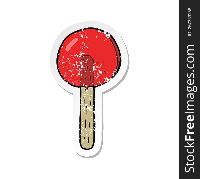 Retro Distressed Sticker Of A Cartoon Lollipop