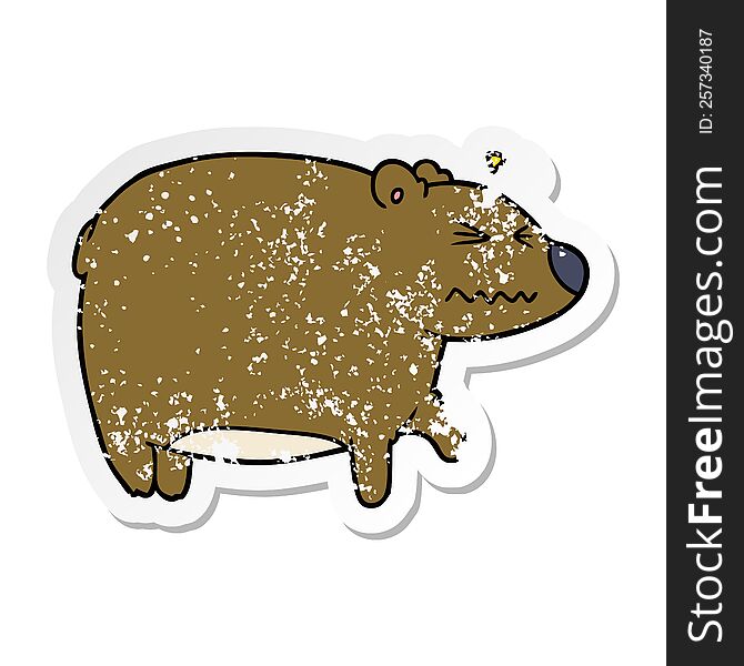 Distressed Sticker Of A Cartoon Bear With A Sore Head