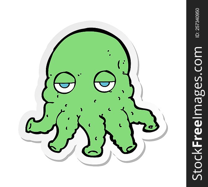 sticker of a cartoon alien squid face