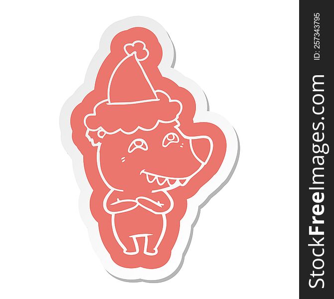 quirky cartoon  sticker of a bear showing teeth wearing santa hat