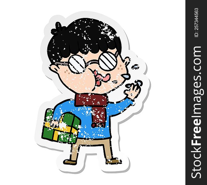 Distressed Sticker Of A Cartoon Boy Wearing Spectacles With Christmas Gift