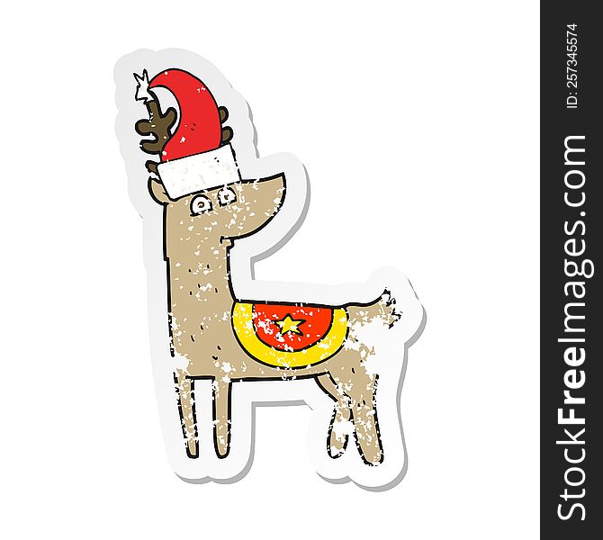 retro distressed sticker of a cartoon reindeer wearing christmas hat