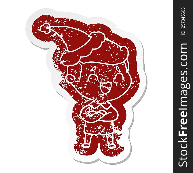 Cartoon Distressed Sticker Of A Laughing Man Wearing Santa Hat