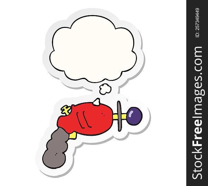 Cartoon Ray Gun And Thought Bubble As A Printed Sticker