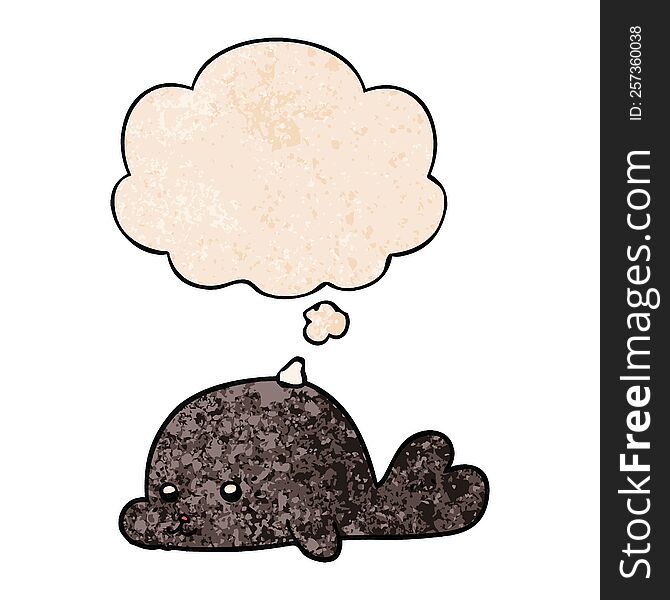 cartoon baby seal and thought bubble in grunge texture pattern style