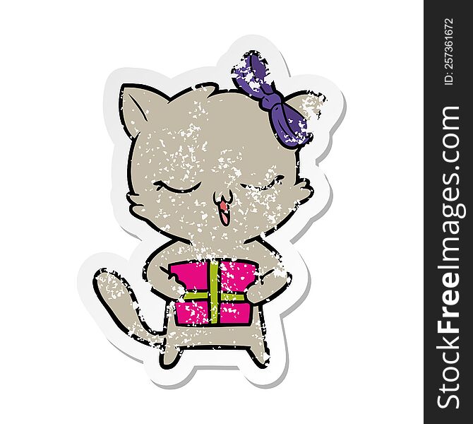 distressed sticker of a cartoon girl cat with christmas present