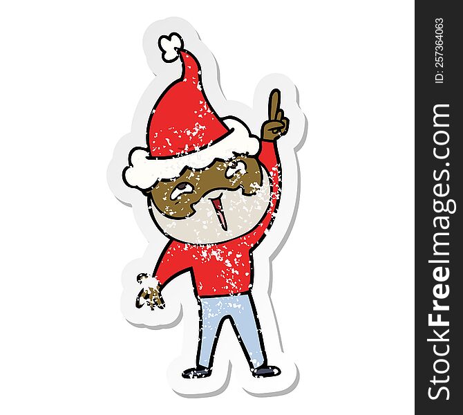 Distressed Sticker Cartoon Of A Happy Bearded Man Wearing Santa Hat