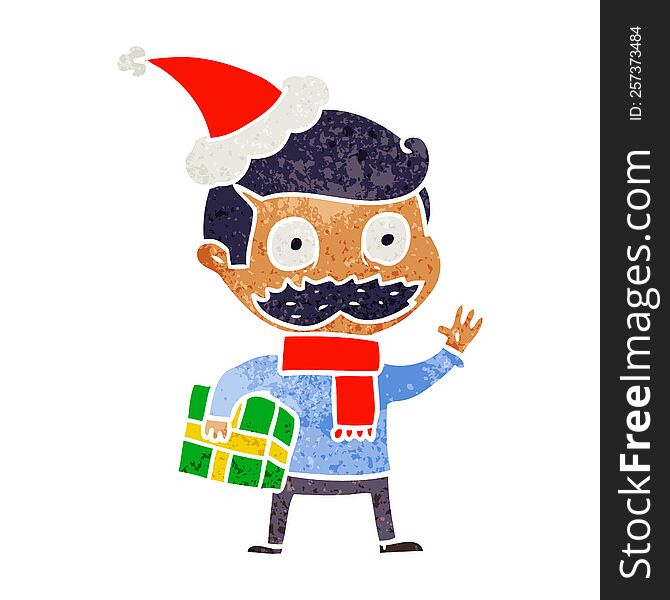 hand drawn retro cartoon of a man with mustache and christmas present wearing santa hat