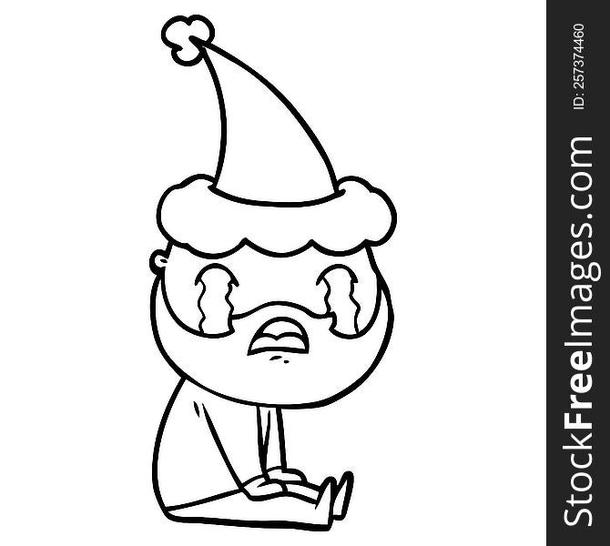 hand drawn line drawing of a bearded man crying wearing santa hat