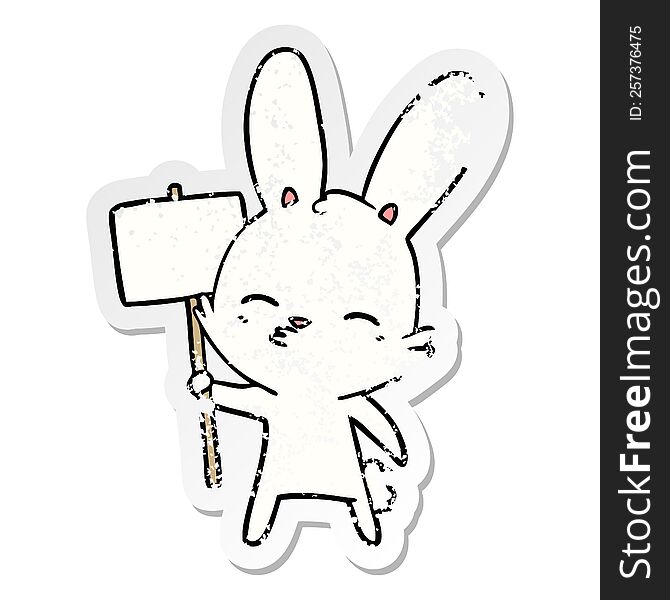 Distressed Sticker Of A Curious Bunny Cartoon With Placard