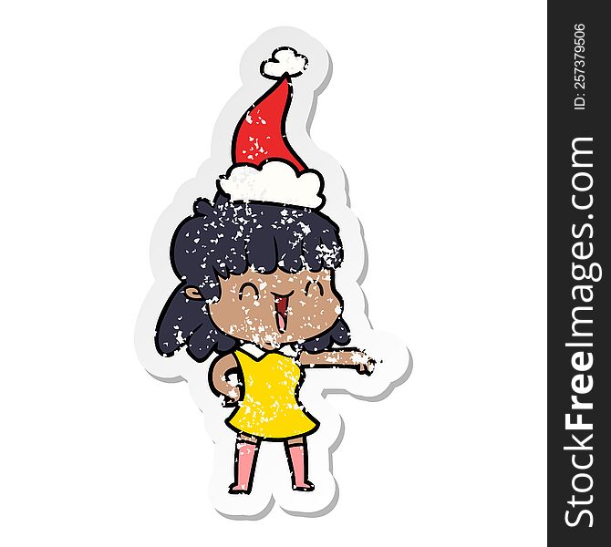 Distressed Sticker Cartoon Of A Happy Girl Wearing Santa Hat