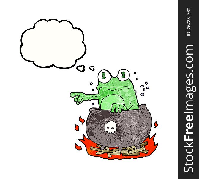 freehand drawn thought bubble textured cartoon halloween toad in cauldron