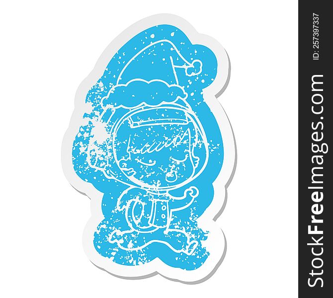 Cartoon Distressed Sticker Of A Pretty Astronaut Girl Running Wearing Santa Hat