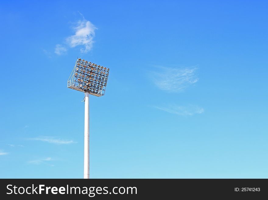 Stadium light on blue sky ,Floodlight from a stadium with the sky as a background.