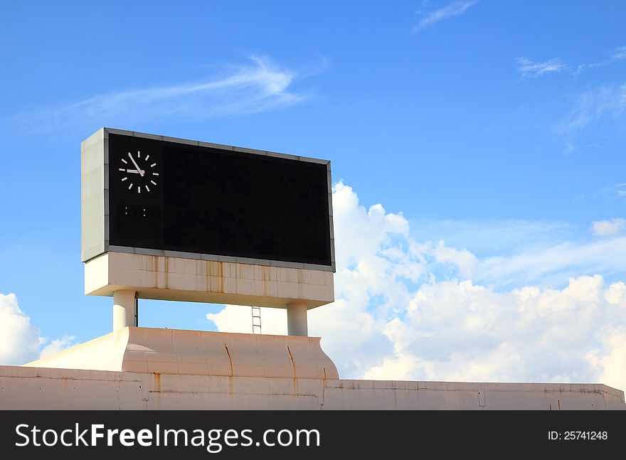 Score board at main stadium on blue sky and cloud , empty score board. Score board at main stadium on blue sky and cloud , empty score board