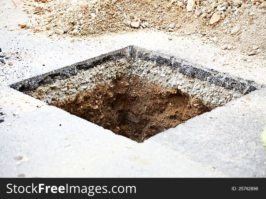 Beneath the asphalt. Layer of soil beneath the asphalt road.