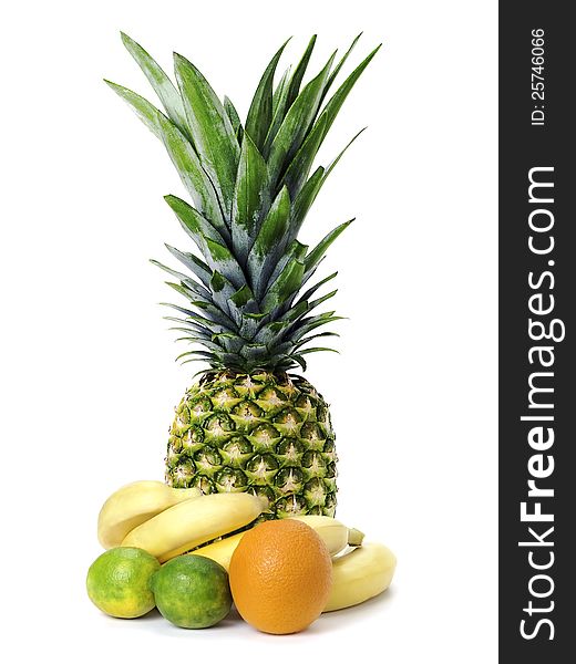 Set of fruit: pineapple, bananas, limes and orange isolated on white. Set of fruit: pineapple, bananas, limes and orange isolated on white