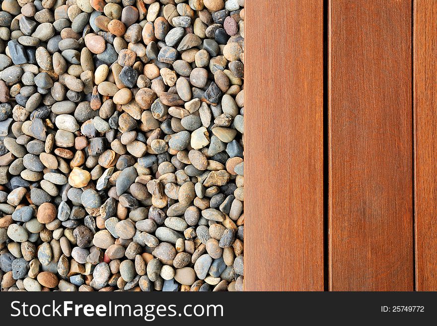 Pebble stone and wood texture. Pebble stone and wood texture