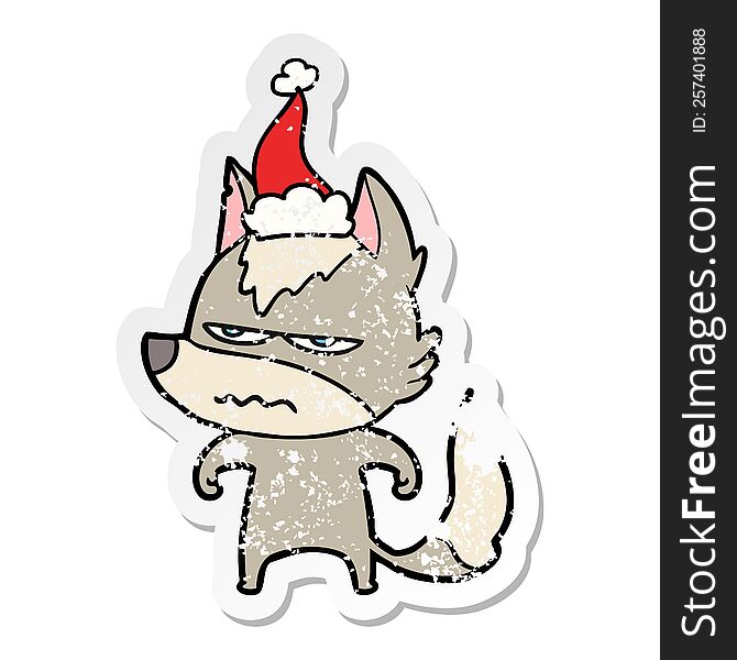 Distressed Sticker Cartoon Of A Annoyed Wolf Wearing Santa Hat