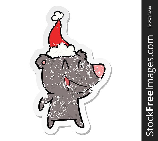 laughing bear hand drawn distressed sticker cartoon of a wearing santa hat. laughing bear hand drawn distressed sticker cartoon of a wearing santa hat
