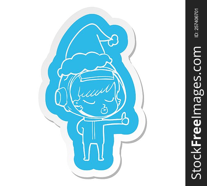 cartoon  sticker of a pretty astronaut girl giving thumbs up wearing santa hat