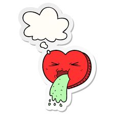 Cartoon Love Sick Heart And Thought Bubble As A Printed Sticker Stock Photo