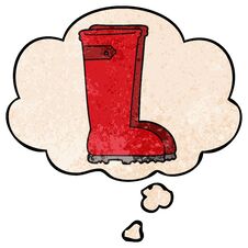 Cartoon Wellington Boots And Thought Bubble In Grunge Texture Pattern Style Stock Photo Cartoon Wellington Boots And Thought Bubble In Grunge Texture Pattern Style Stock Photo