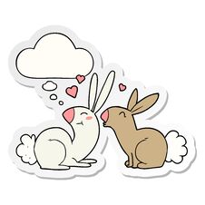 Cartoon Rabbits In Love And Thought Bubble As A Printed Sticker Stock Image