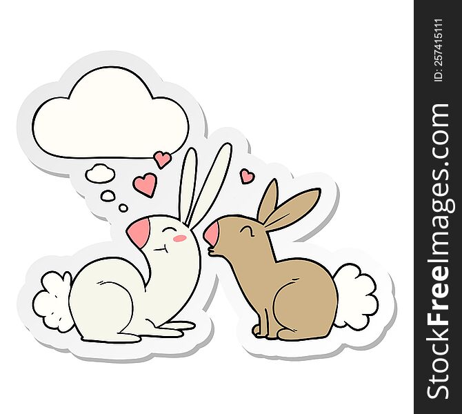 cartoon rabbits in love with thought bubble as a printed sticker