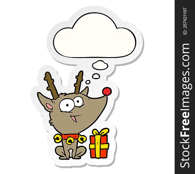 cartoon christmas reindeer with thought bubble as a printed sticker
