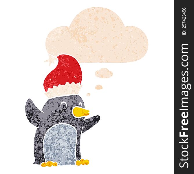 Cute Cartoon Christmas Penguin And Thought Bubble In Retro Textured Style