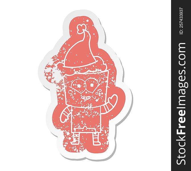 happy cartoon distressed sticker of a robot waving hello wearing santa hat