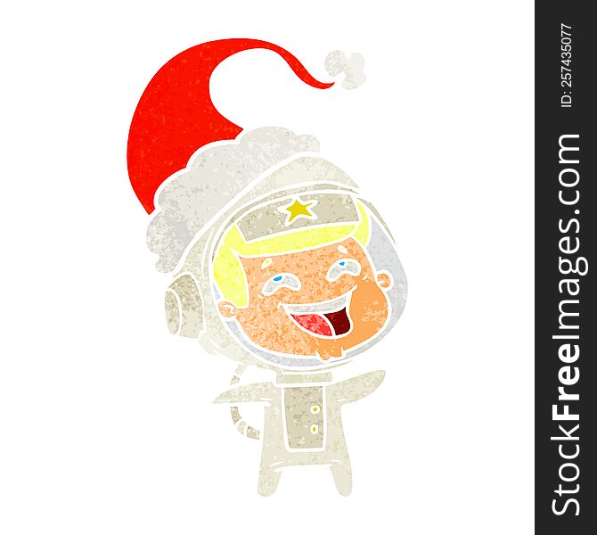 Retro Cartoon Of A Laughing Astronaut Wearing Santa Hat