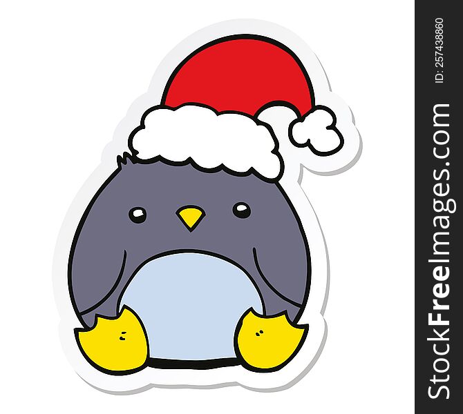 sticker of a cute cartoon penguin wearing christmas hat