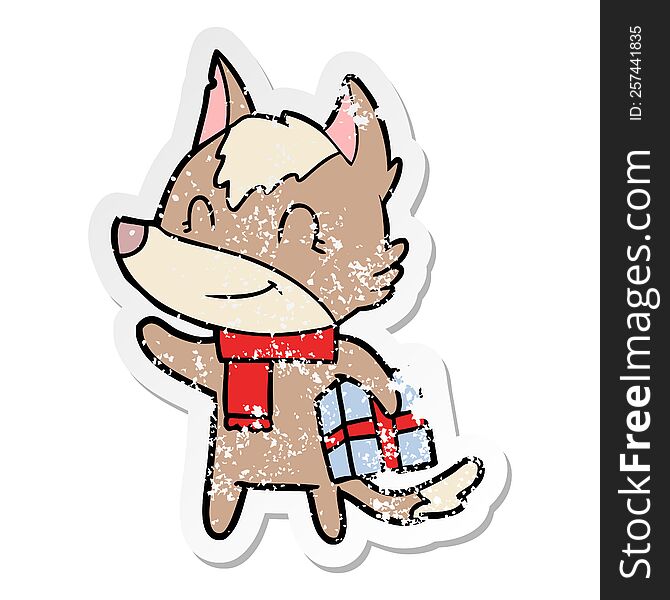Distressed Sticker Of A Friendly Cartoon Wolf With Present