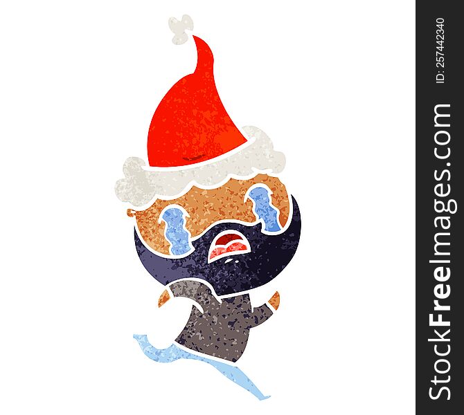 hand drawn retro cartoon of a bearded man crying wearing santa hat
