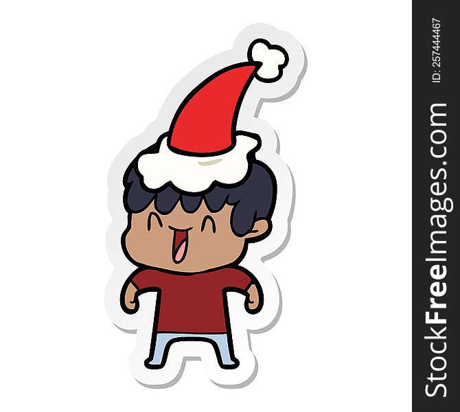 hand drawn sticker cartoon of a laughing boy wearing santa hat